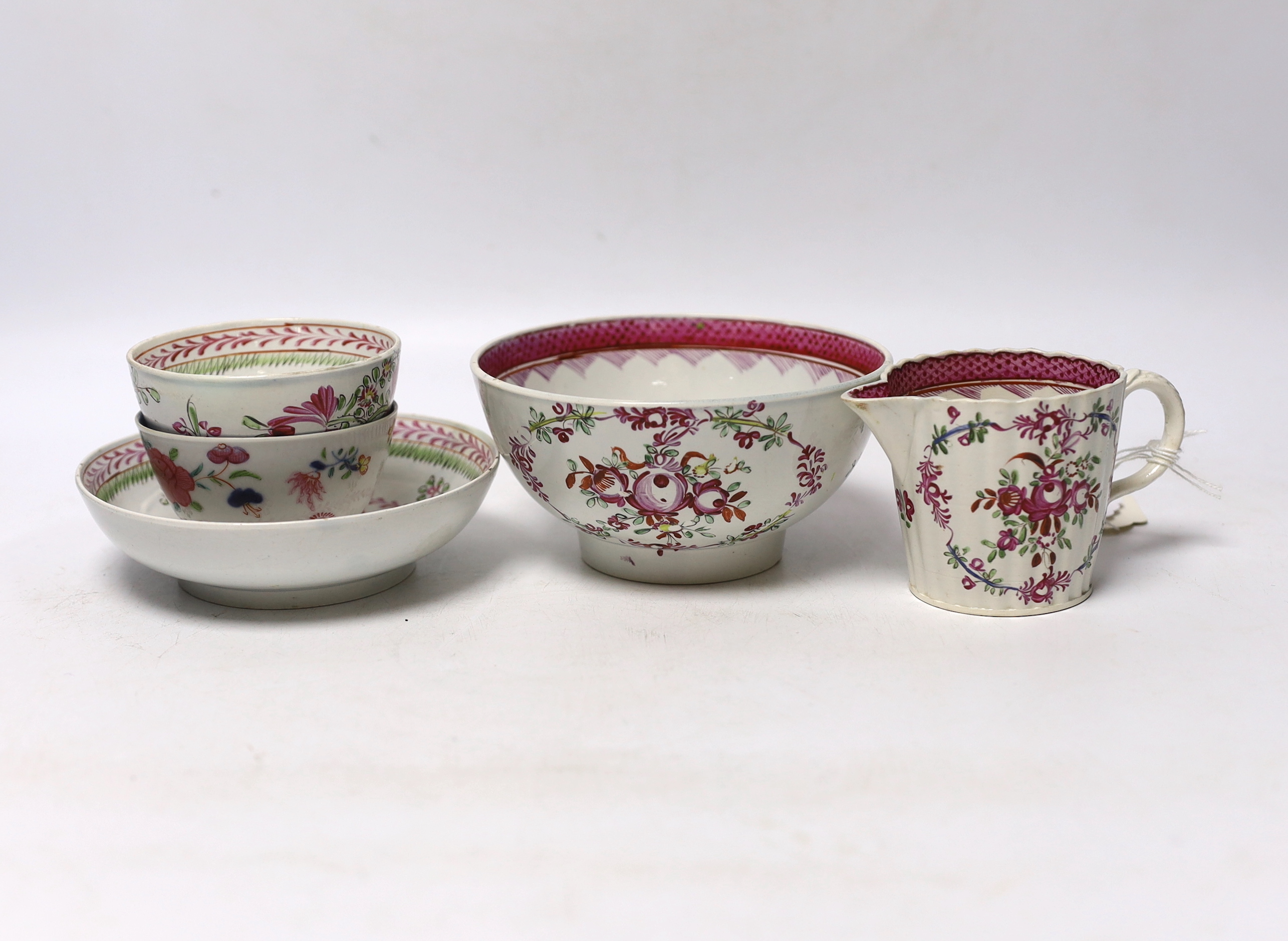 Late 18th/early 19th century pearlware small jug, sugar bowl and a cream jug, 6.5cm high and a late 18th century Chinese export teabowl